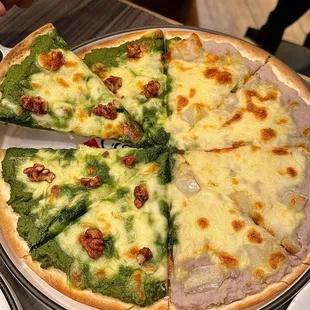 a pizza with a slice taken out of it