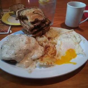 Country fried steak and eggs hasbrown and rye toast delicious!!!