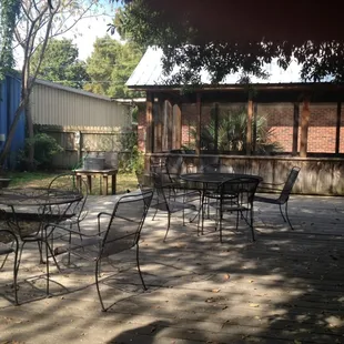 patio with tables and chairs