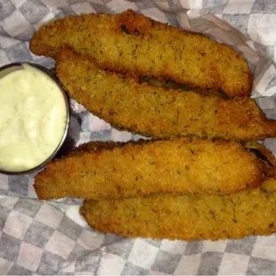 Fried pickle spears served with ranch dressing