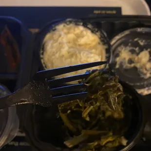 Mushy potatoe salad and uncut greens