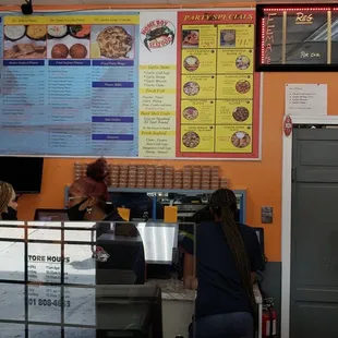 customers at the counter of a restaurant