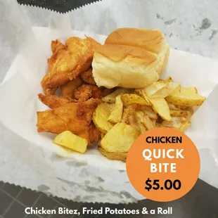 a basket of fried potatoes and a roll