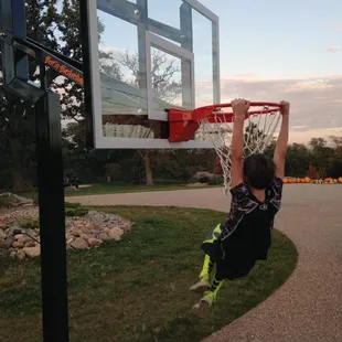 Adjustable Goalsetter basketball hoops with regulation backboards
