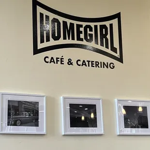 three black and white photographs on the wall