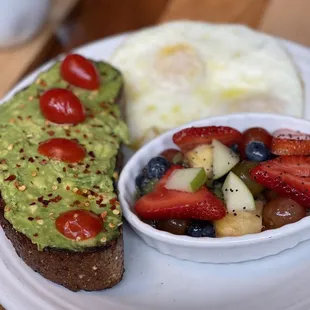 Avocado toast also comes with fruit and eggs