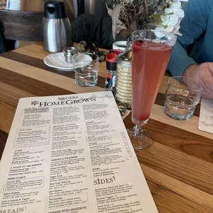 Cranberry mimosa and menu.
