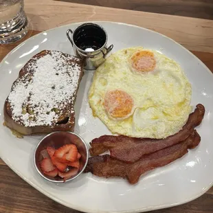 French toast, over easy eggs, bacon