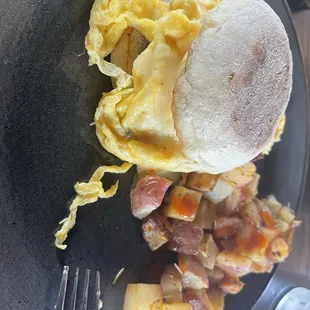 Breakfast Sammy with sauasage and pepperjack.  Red potatoes on the side