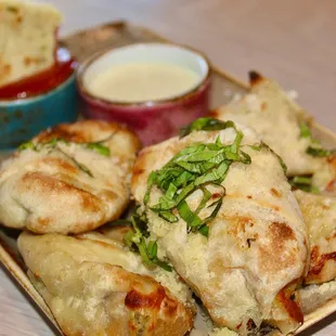 The Pepperoni Rolls were tossed in Parmesan, Served with Ranch and House-made Marinara Sauce.