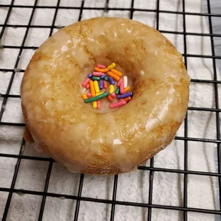 Half Naked Vanilla Glaze Doughnut with sprinkles