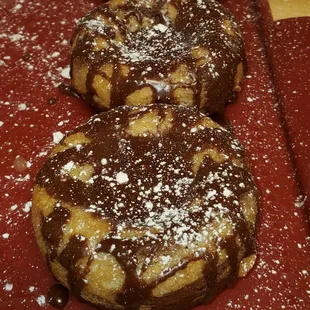 Half & Half Naked Doughnuts with Almond Chocolate Glaze and powdered sugar