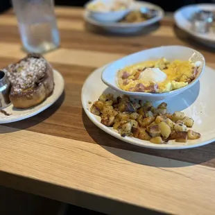 Delicious hot egg scramble with seasoned potatoes and a cinnamon French toast.