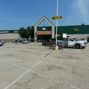 a parking lot with several cars parked in it