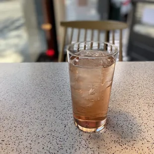 a glass of water on a table