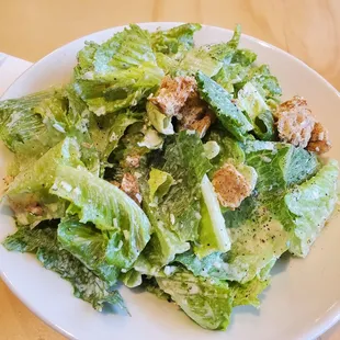 a plate of salad on a table