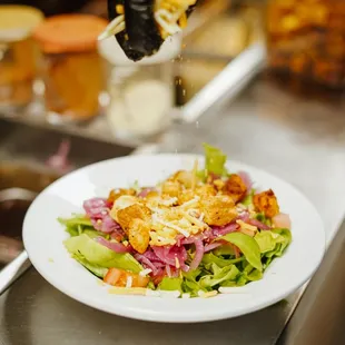 a plate of food being prepared