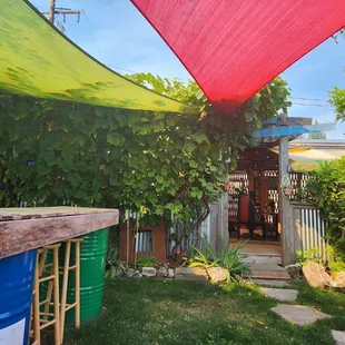 a patio with a table and chairs