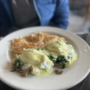 Egg Benedict with mushroom and spinach