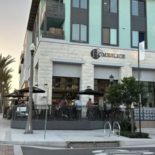 The wrap-around patio. Many tables, high tops and counter height.