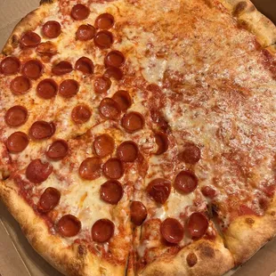 a pepperoni pizza in a box