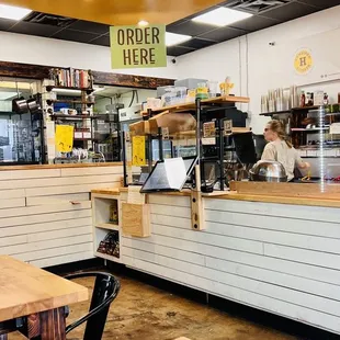 a view of the kitchen from the dining area
