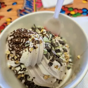 My combo of cookies and cream plus cheesecake and sprinkles and nuts on top.