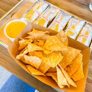 Taco and little queso with chips