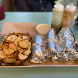 Potatoes and Lil&apos; Queso with Tijuana Panther, Chicken, brisket