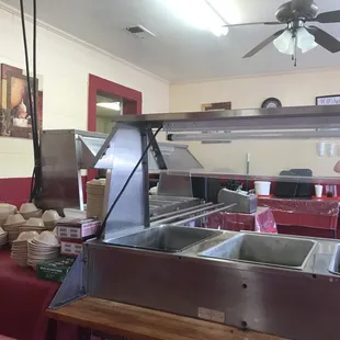 a man preparing food in a commercial kitchen