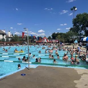 Fourth of July Summer bash with a live DJ, a delicious buffet, and inflatables!