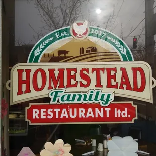 a sign in the window