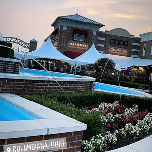 a pool in front of a building