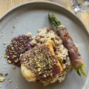 Sea bass with prosciutto wrapped asparagus