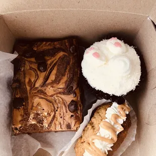 Cheesecake brownie, coconut bunny cupcake, peanut butter taco