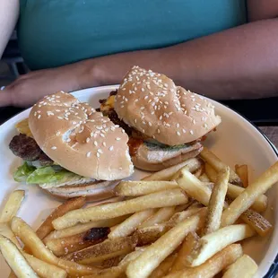 two burgers and french fries