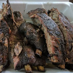 Half slab of pork ribs. Add any or all of 6 sauces. Perfect BBQ ribs. Sweet, Tangy, House. Spicey Sweet, Tangy or House.