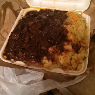 Oxtails ... Gravy on my rice per my request!! Tender and delicious