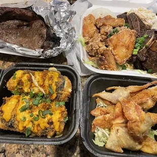 Ribeye steak, Korean chicken and Kalbi ribs combo, deep fried musubi and Kalua wontons