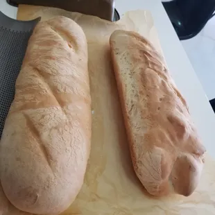 two loaves on a cutting board