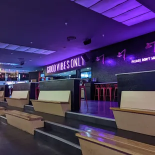 the seating area of a bowling alley