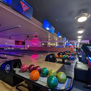 a bowling alley with bowling balls