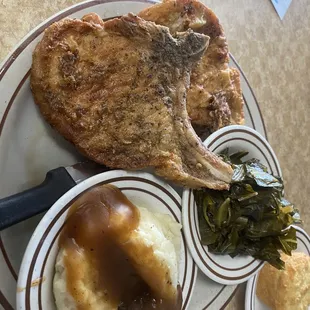 Fried pork chops, collard greens, mashed potatoes with gravy and corn muffin! Delicious