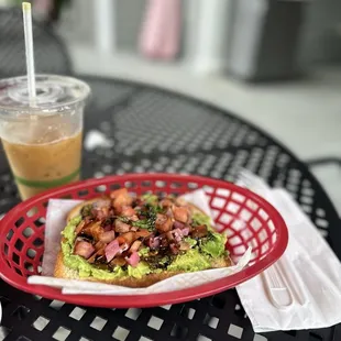 The Toast - sourdough toast w/ avocado, tomato, fresh basil, pickled onions and balsamic drizzle and a Lavender Latte