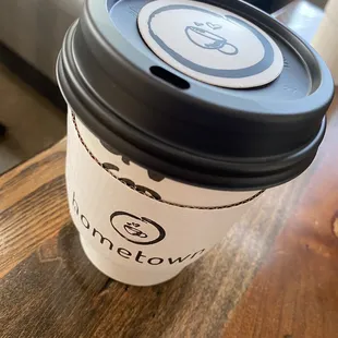 a coffee cup on a table