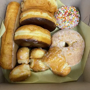 a variety of doughnuts in a box
