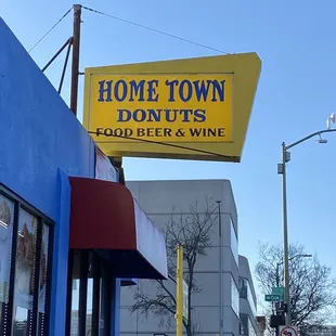 a sign for home town donuts