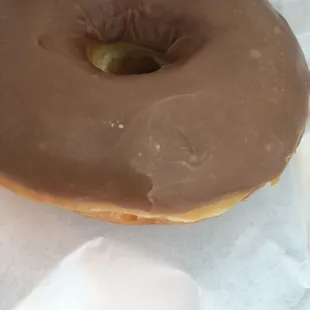 a chocolate frosted donut