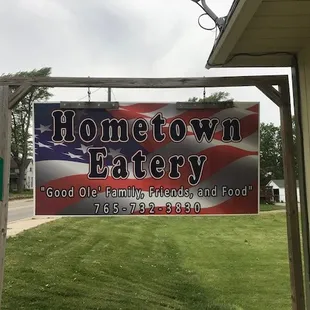 a sign for a local eatery