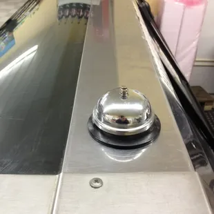 A quick tap of the bell will get you help at the fresh meat counter.
